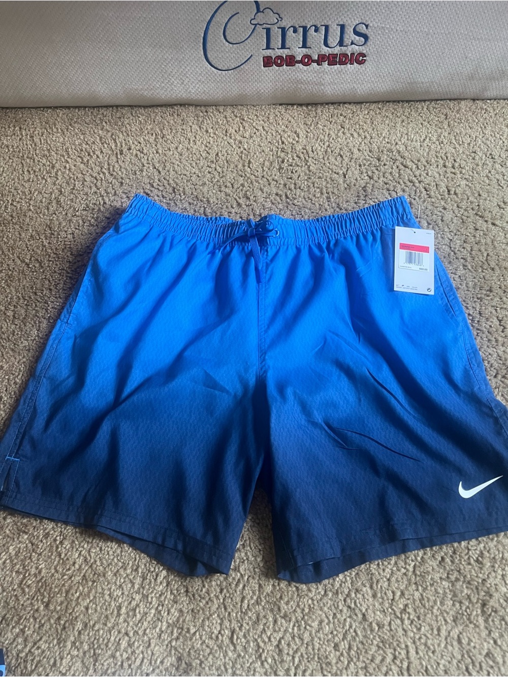 Nike Blue Tag on White Retail Hang Card